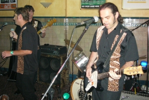 Photo of The Men from
    U.N.C.L.E. live at the Kay-Bee, 5 Mar. 2005.